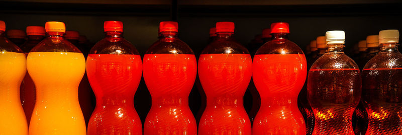 Close-up of wine bottles on table