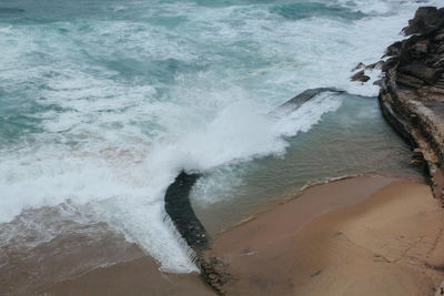 High angle view of waves in sea