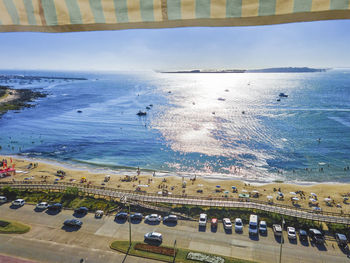 High angle view of beach against sky in city