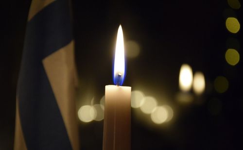 Close-up of illuminated candle