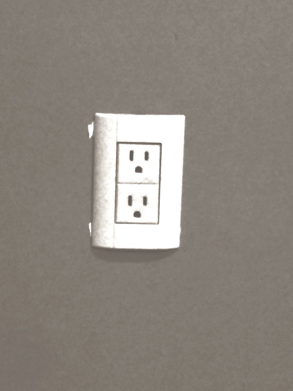 indoors, wall - building feature, copy space, single object, still life, wall, close-up, studio shot, technology, electricity, no people, connection, communication, table, home interior, simplicity, man made object, geometric shape, white color, metal