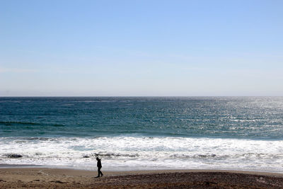 Scenic view of sea against clear sky