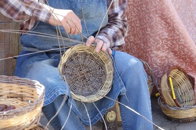 Low section of man in basket