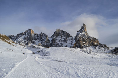 Scenic view of snowcapped mountains against sky