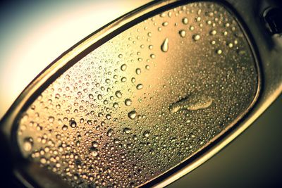 Close-up of raindrops on glass window