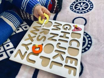 High angle view of person holding text