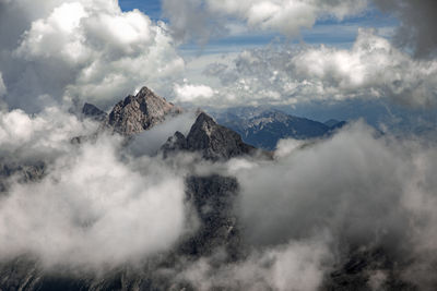 Mountain peaks were drowned in clouds