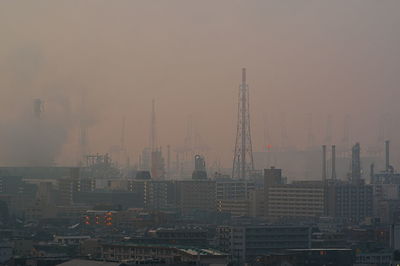 Cityscape against sky during sunset