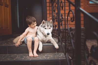 Full length of man with dog