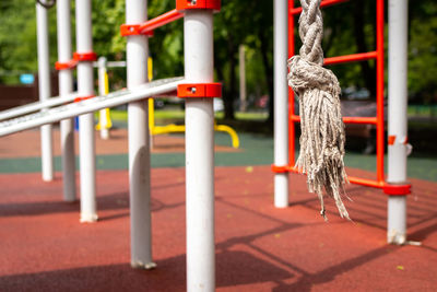 Close-up of rope tied to pole