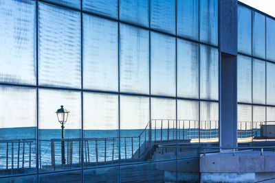 Modern building seen through glass window