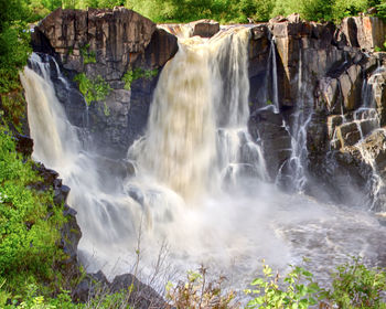 View of waterfall in forest