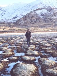 Full length of man on beach against sky