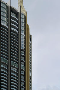 Low angle view of modern buildings against sky