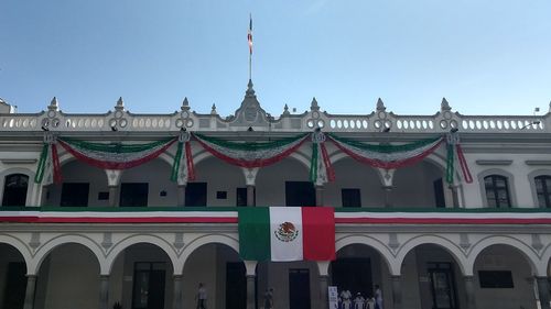 Low angle view of building against blue sky