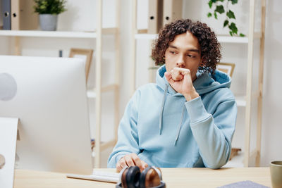 Freelancer working on table at home