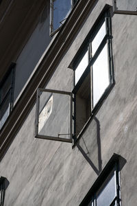 Low angle view of basketball hoop against building