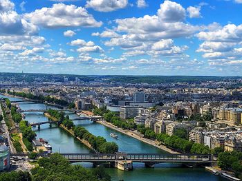 High angle view of bridge over river against buildings in city