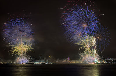 Firework display at night