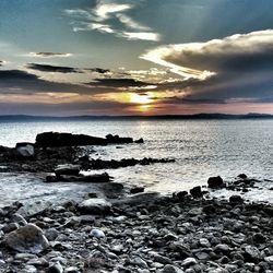 Scenic view of sea against sky during sunset