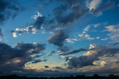 Low angle view of clouds in sky during sunset