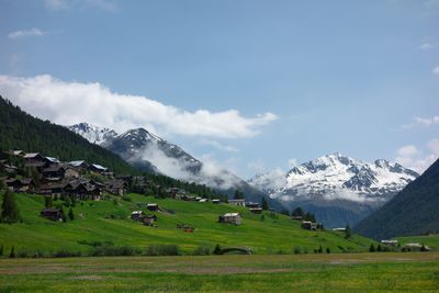 Scenic view of snowcapped mountains against sky