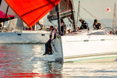 People sailing in sea