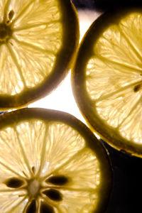 Close-up of lemon slice on table