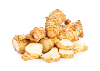 Close-up of cake against white background