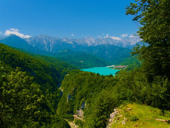 Scenic view of landscape and mountains against sky