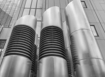 Low angle view of pipes in building