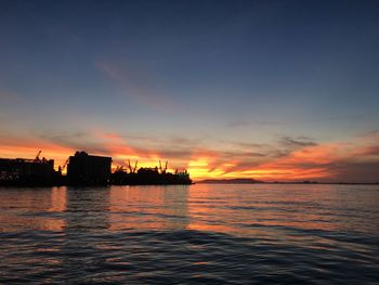 Scenic view of sea at sunset