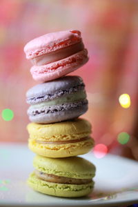 Stack of macaroons on plate