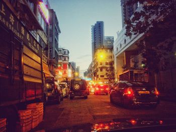 Cars on road in city at night