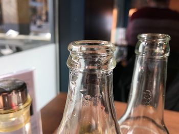 Close-up of glassbottles on table