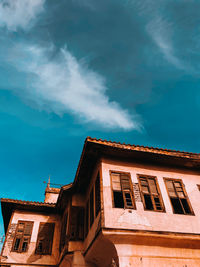 Low angle view of old building against sky