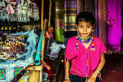 Portrait of young woman standing in temple