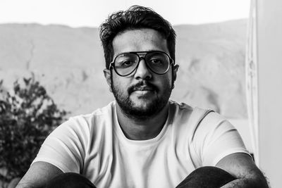 Portrait of young man wearing eyeglasses