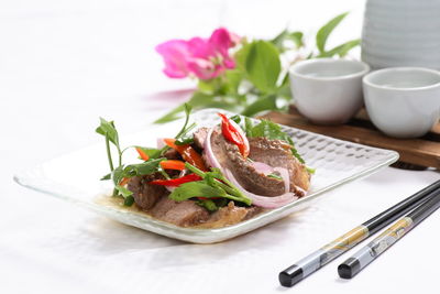 Close-up of salad in plate on table