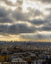 High angle view of buildings against sky during sunset
