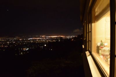 Illuminated cityscape at night