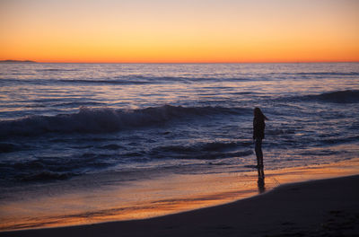 Scenic view of sea at sunset