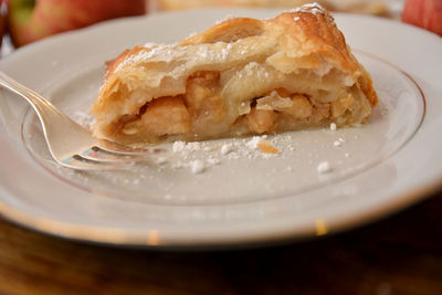 Close-up of cake served in plate on table