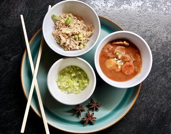 High angle view of chinese meal served on table