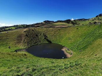 Scenic view of land against clear sky