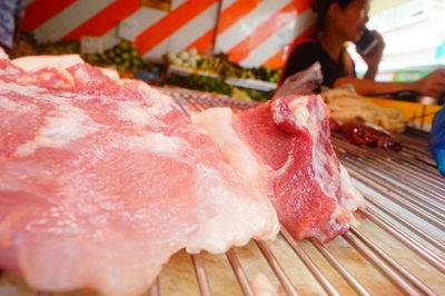 Close-up of meat on barbecue grill