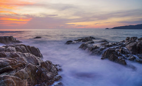 Scenic view of sea against sky during sunset