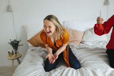 Happy girl on bed