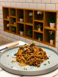 Close-up of noodles served in plate on table