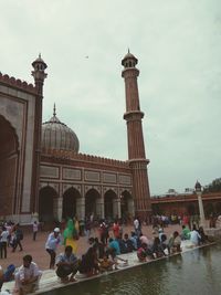 People in front of building